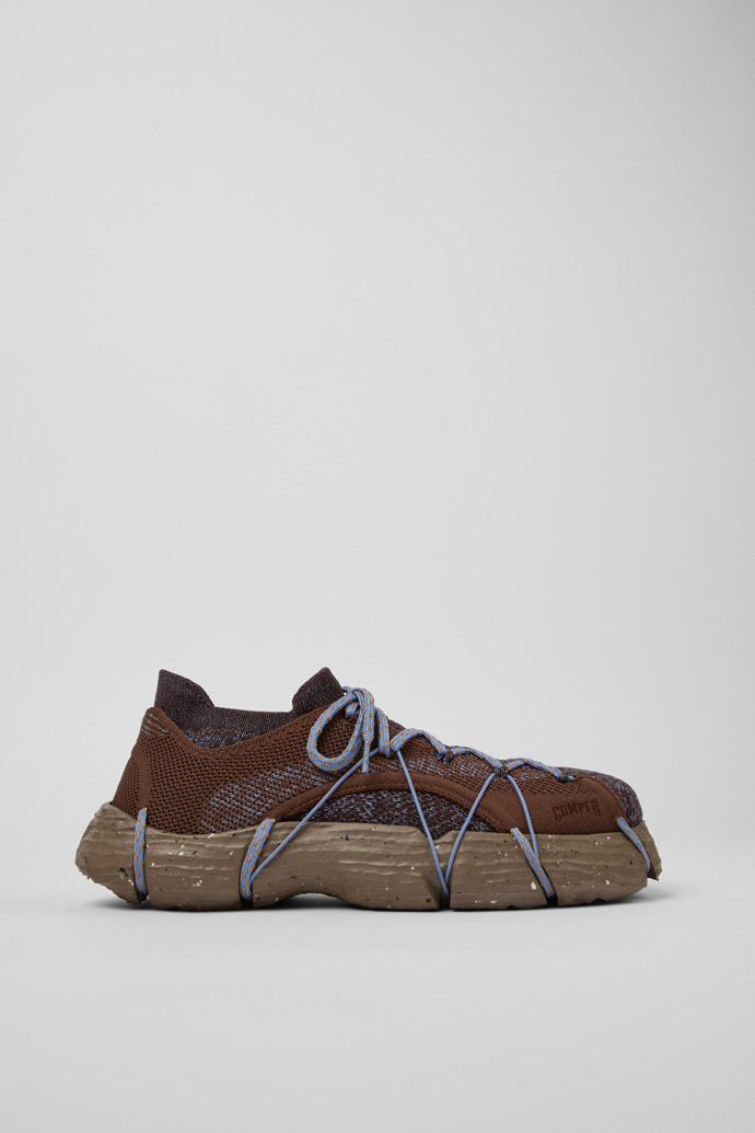 A model wearing ROKU Shoe Uppers Brown/blue uppers (x2) for your right and left shoes.