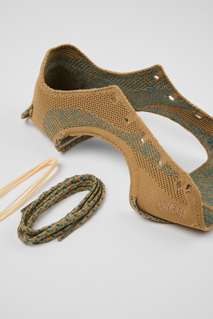 Close-up view of ROKU Shoe Uppers Brown and green uppers (x2) for your right and left shoes.