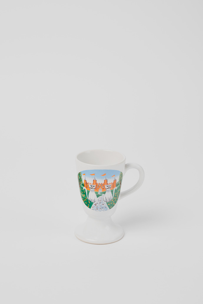 Side view of Vintage cup Small white ceramic cup with illustration