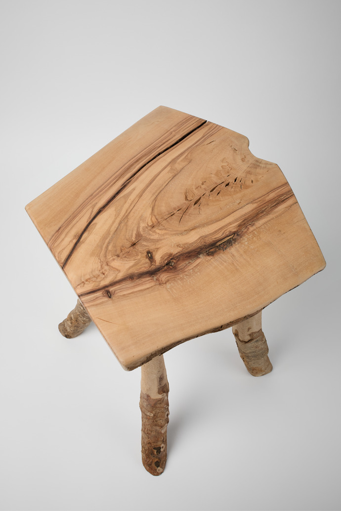 Overhead view of 'Ullastre' stool Handmade olive wood stool