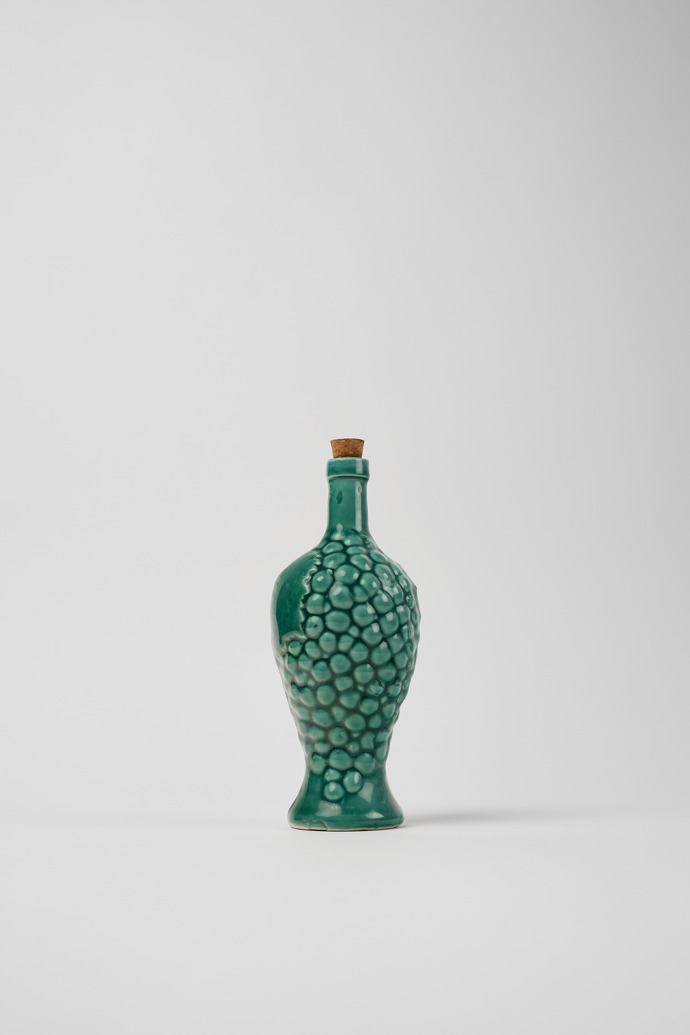 Side view of Decorative bottle Handmade blue-green ceramic bottle