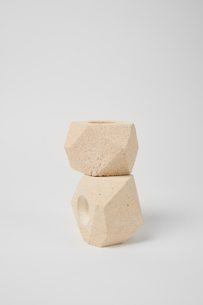 Front view of 2 'marès' stone candle holders 2 stone candleholders