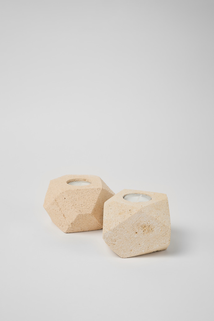 Side view of 2 'marès' stone candle holders 2 stone candleholders