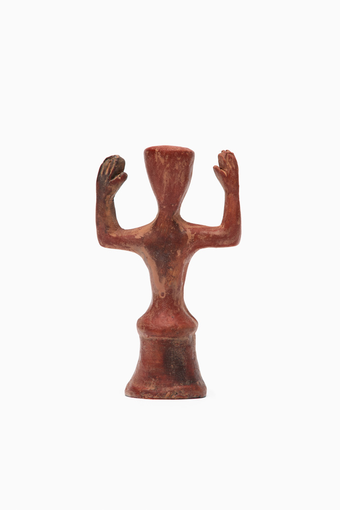 Back view of Minoan goddess Ceramic goddess replica