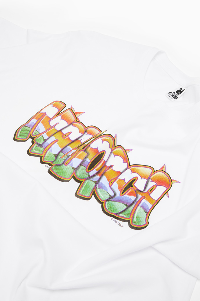 Close-up view of Graffiti Tee Retro souvenir t-shirt with graffiti-style Mallorca lettering