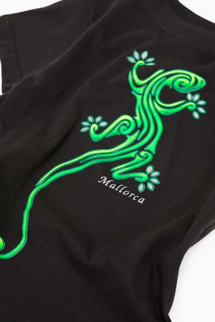 Close-up view of Glow-in-the-Dark Lizard Kids’ Tee Glow-in-the-dark Mallorca t-shirt for kids, featuring a lizard
