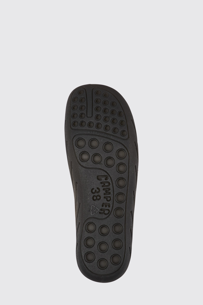 The sole of Wabi Black monomaterial sandals for women