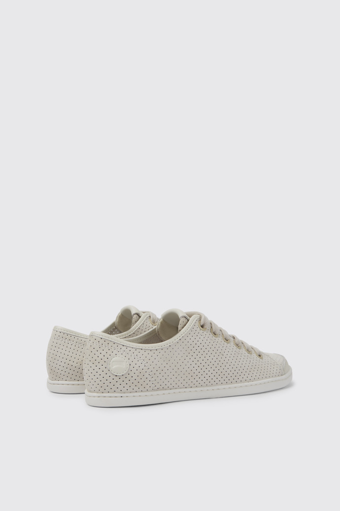 Uno Tenis de piel en color beige y blanco para mujer