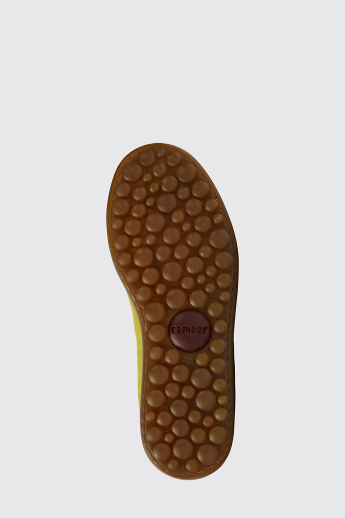 The sole of Pelotas Yellow nubuck sneakers for women