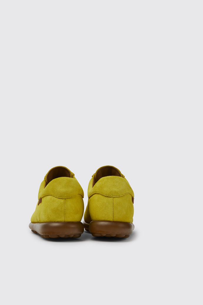 Back view of Pelotas Yellow nubuck sneakers for women