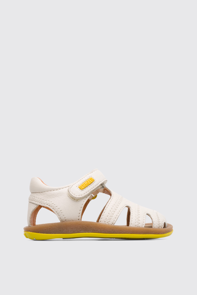 Side view of Bicho Closed cream T-strap sandal for kids