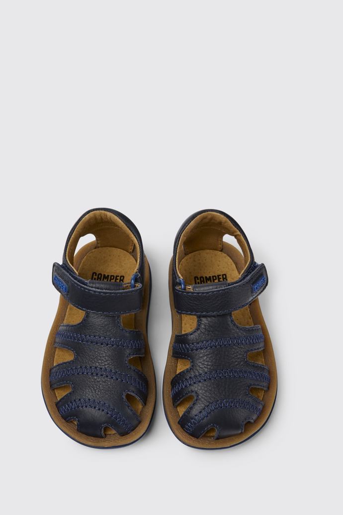 Overhead view of Bicho Blue leather sandals for kids