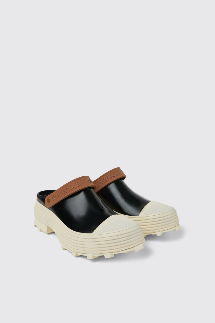 Front view of TRAKTORI Black-White-Brown Leather Clogs