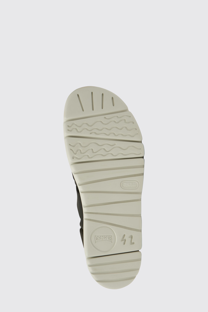 The sole of Oruga Men’s black sandal