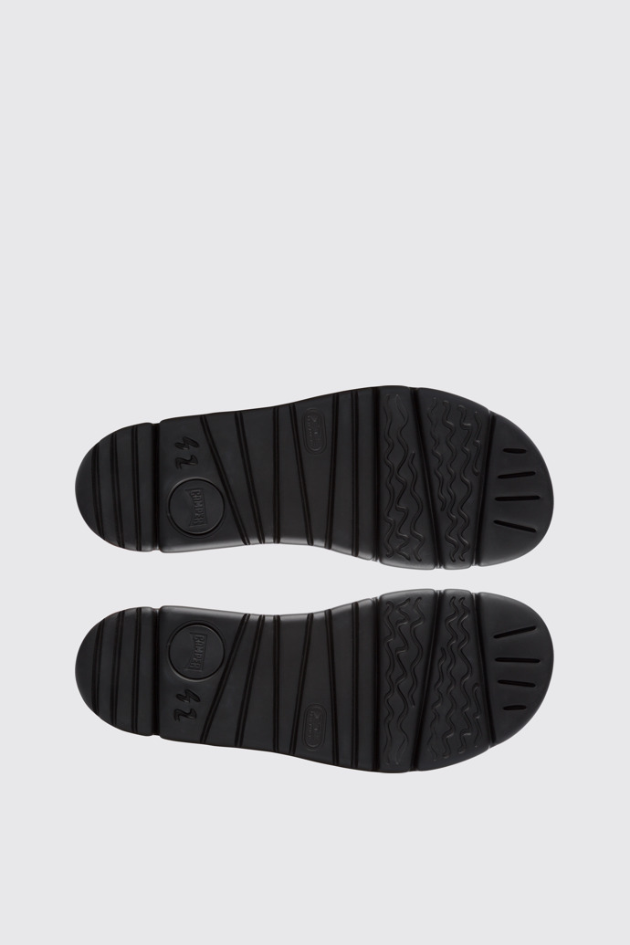 The sole of Twins Men’s navy and black sandal
