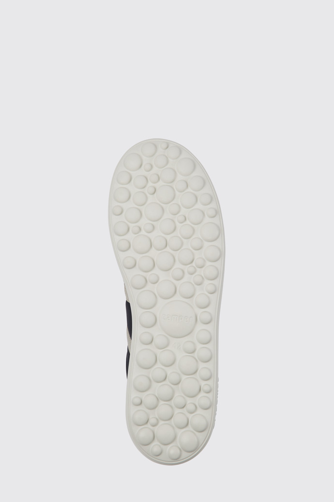 The sole of Pelotas XLite Blue, grey, and yellow sneakers for men