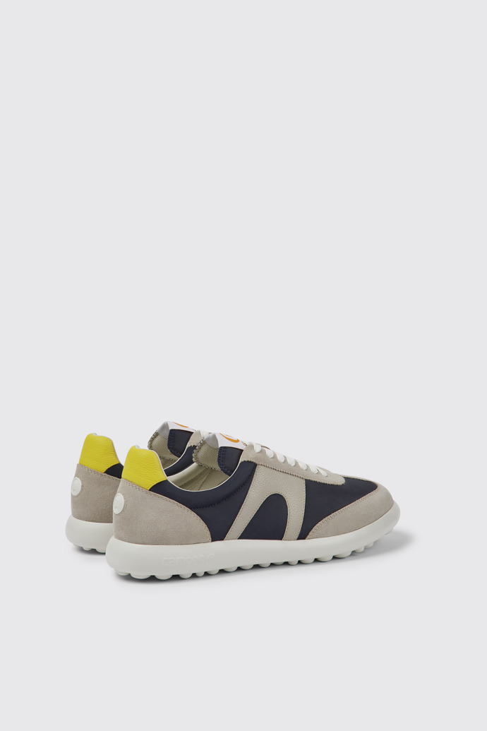 Back view of Pelotas XLite Blue, grey, and yellow sneakers for men