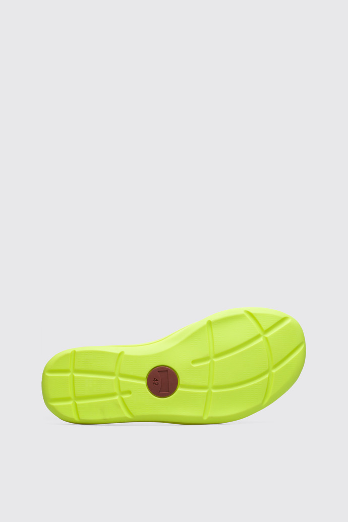 The sole of Match Men’s neon yellow slide