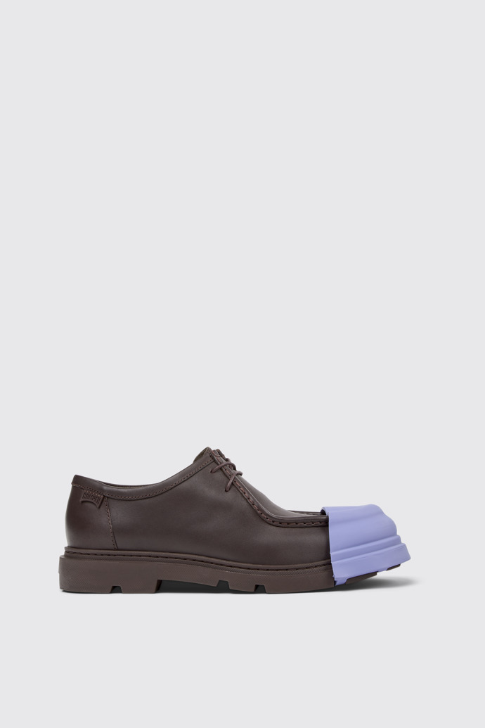 Junction Chaussures en cuir marron pour homme.