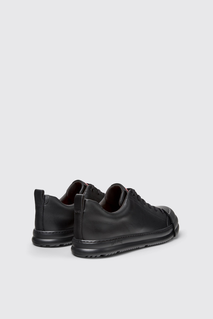 Junction Runner Ténis em couro pretos para homem.
