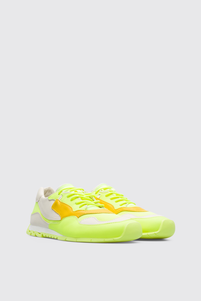 Front view of Nothing Women’s neon yellow sneaker