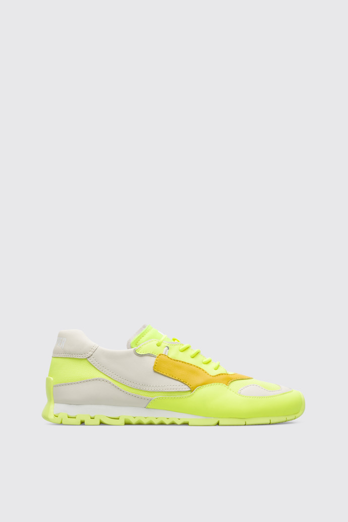 Side view of Nothing Women’s neon yellow sneaker