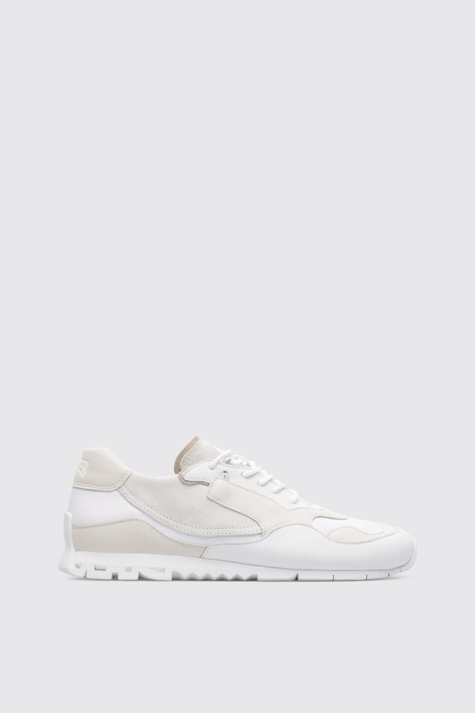 Side view of Nothing Women’s white sneaker
