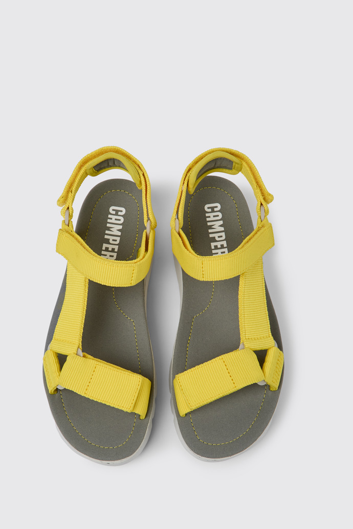 Overhead view of Oruga Up Yellow recycled PET sandals for women