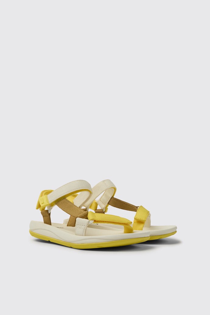 Front view of Match Yellow, white, and brown sandals for women