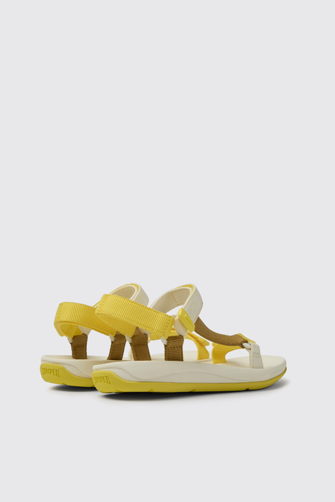 Back view of Match Yellow, white, and brown sandals for women