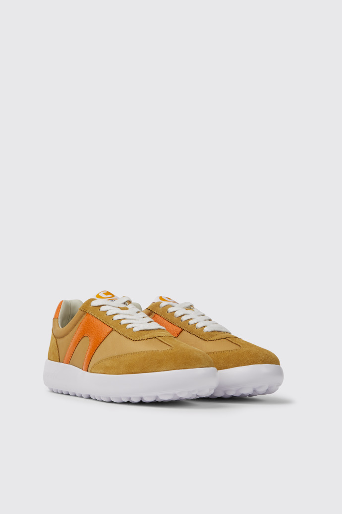 Front view of Pelotas XLite Beige and orange sneakers for women