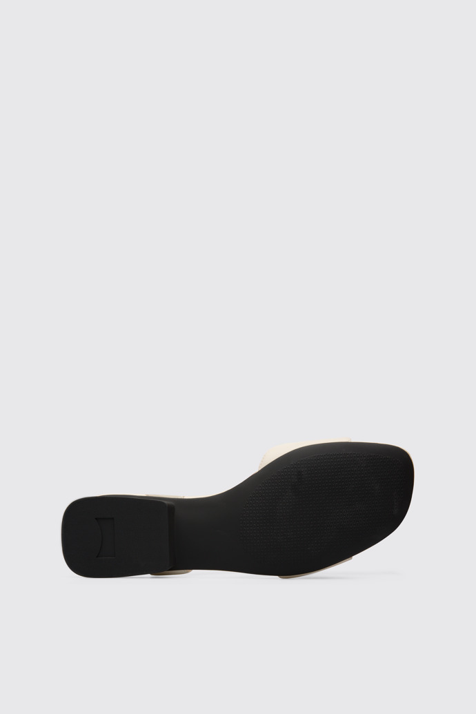 The sole of Casi Myra Women’s cream textile T-strap sandal