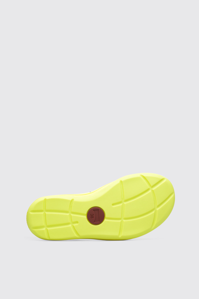 The sole of Match Men’s neon yellow slide