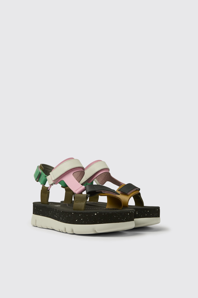 Front view of Oruga Up Green, pink, and white leather sandals for women
