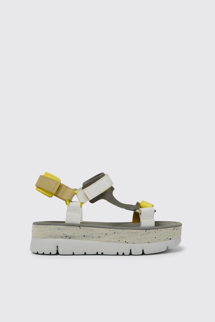 Side view of Oruga Up White, grey, and yellow leather sandals for women