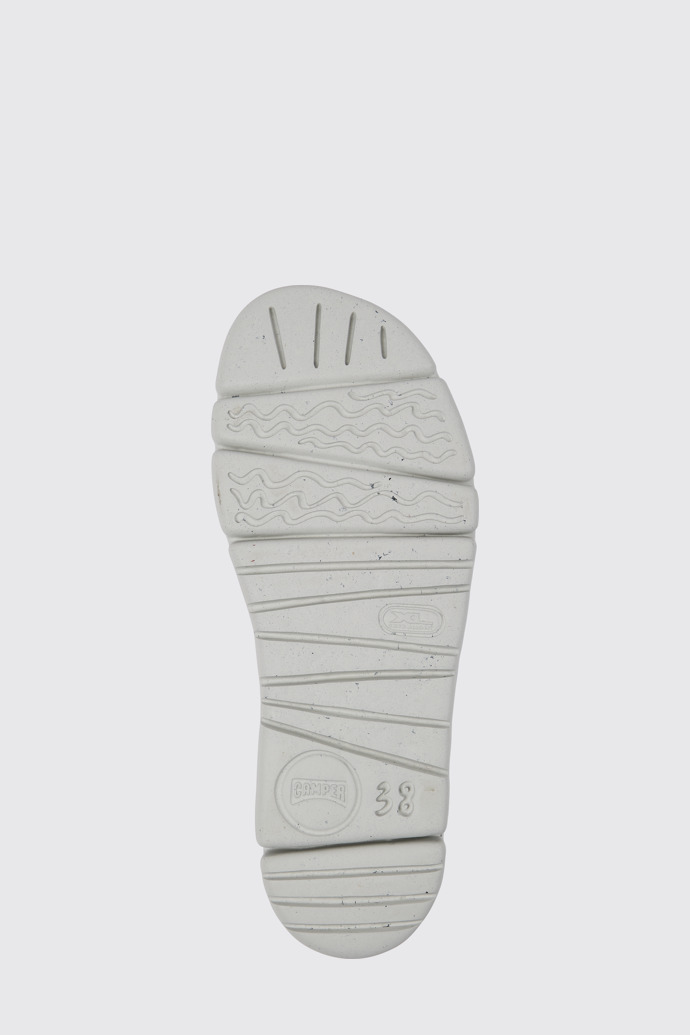 The sole of Oruga Up White, grey, and yellow leather sandals for women