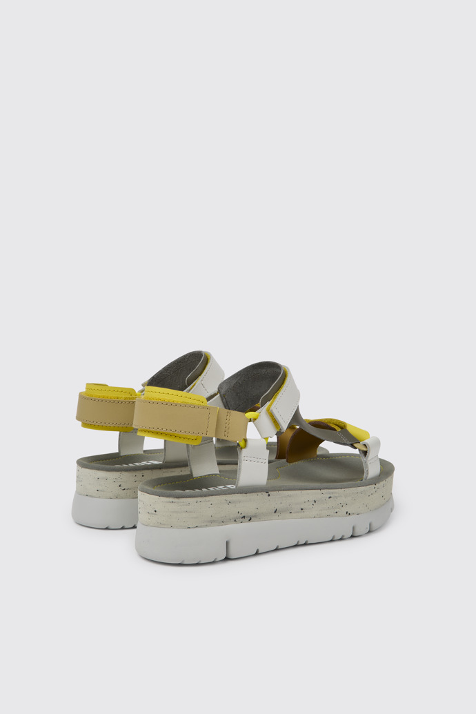 Back view of Oruga Up White, grey, and yellow leather sandals for women