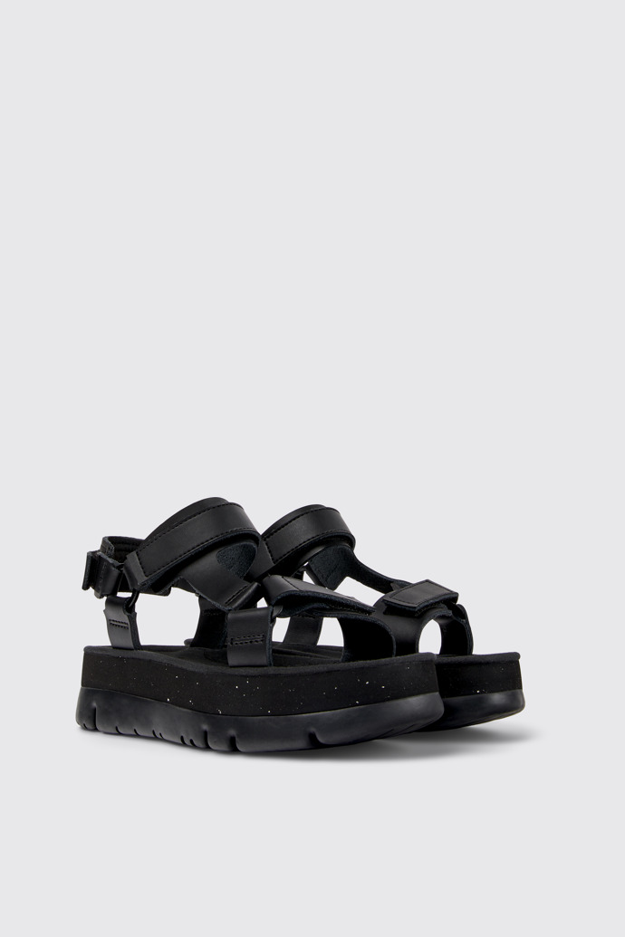 Front view of Oruga Up Black leather sandals for women