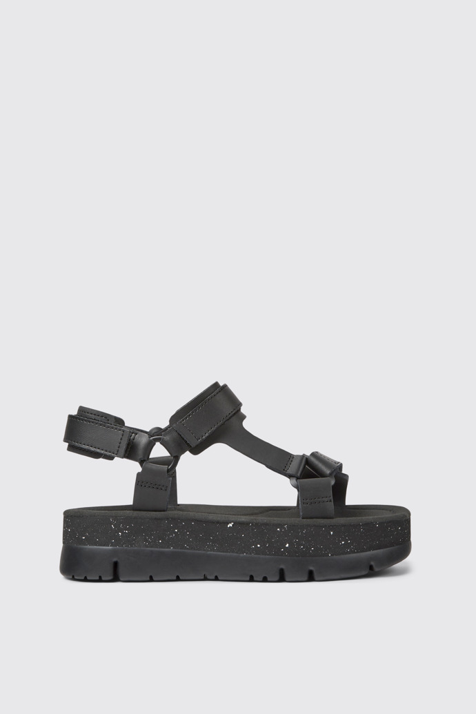 Side view of Oruga Up Black leather sandals for women