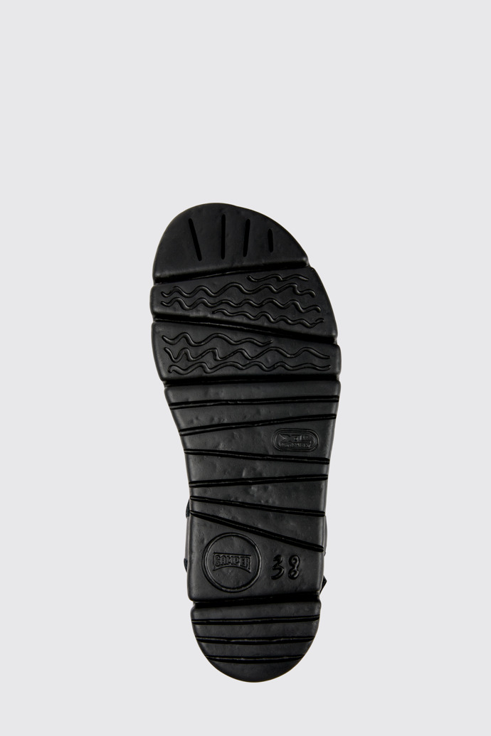 The sole of Oruga Up Black leather sandals for women