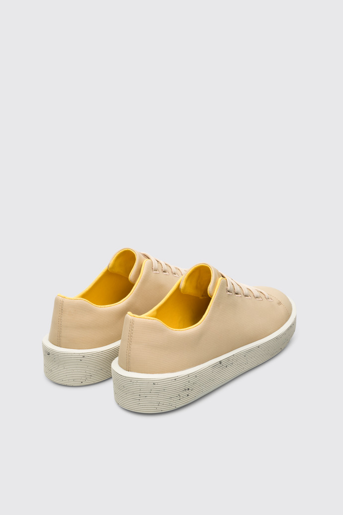 Back view of Courb Beige sneaker for women