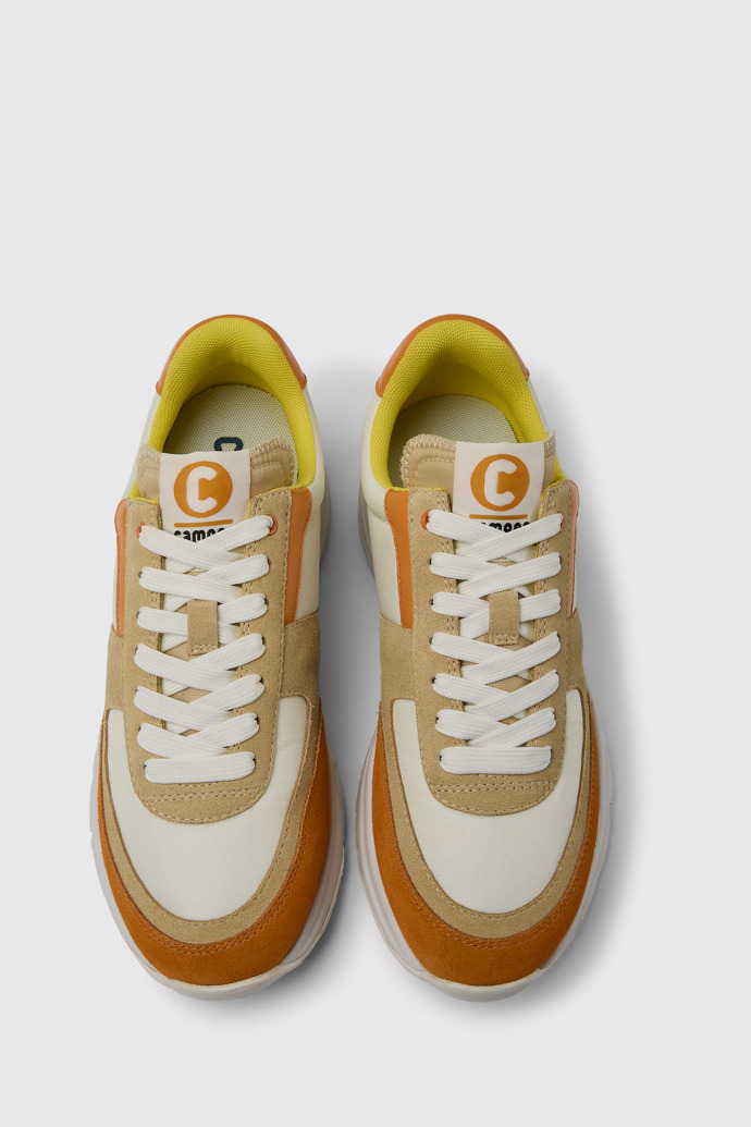 Overhead view of Drift White, beige, and orange nubuck sneakers for women