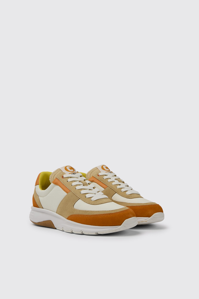Front view of Drift White, beige, and orange nubuck sneakers for women