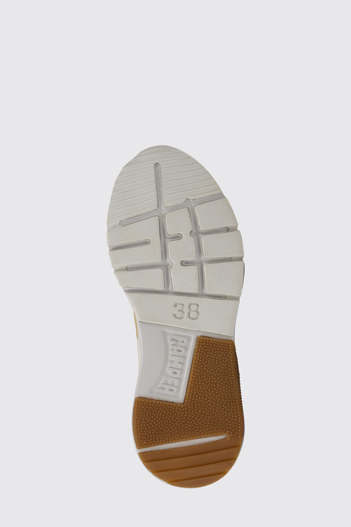 The sole of Drift White, beige, and orange nubuck sneakers for women