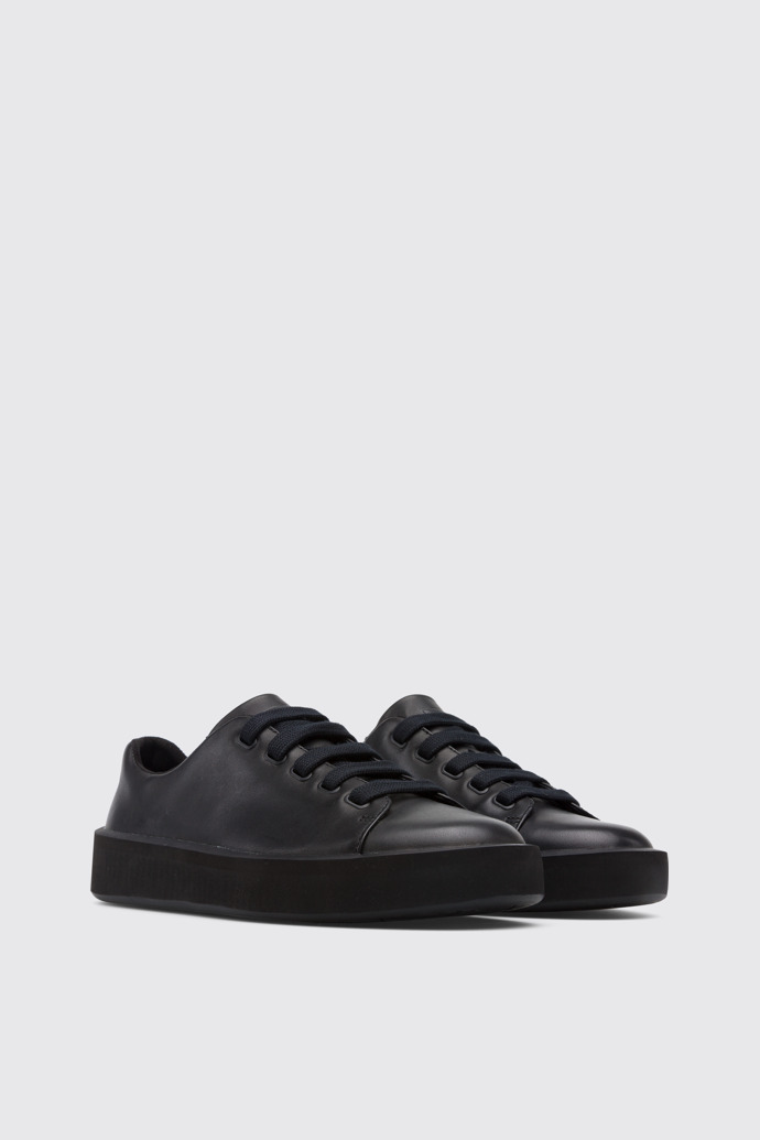Front view of Courb Women's black sneaker