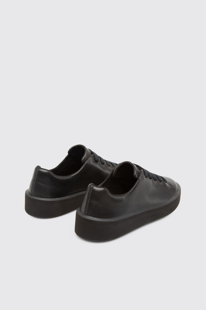 Back view of Courb Women's black sneaker