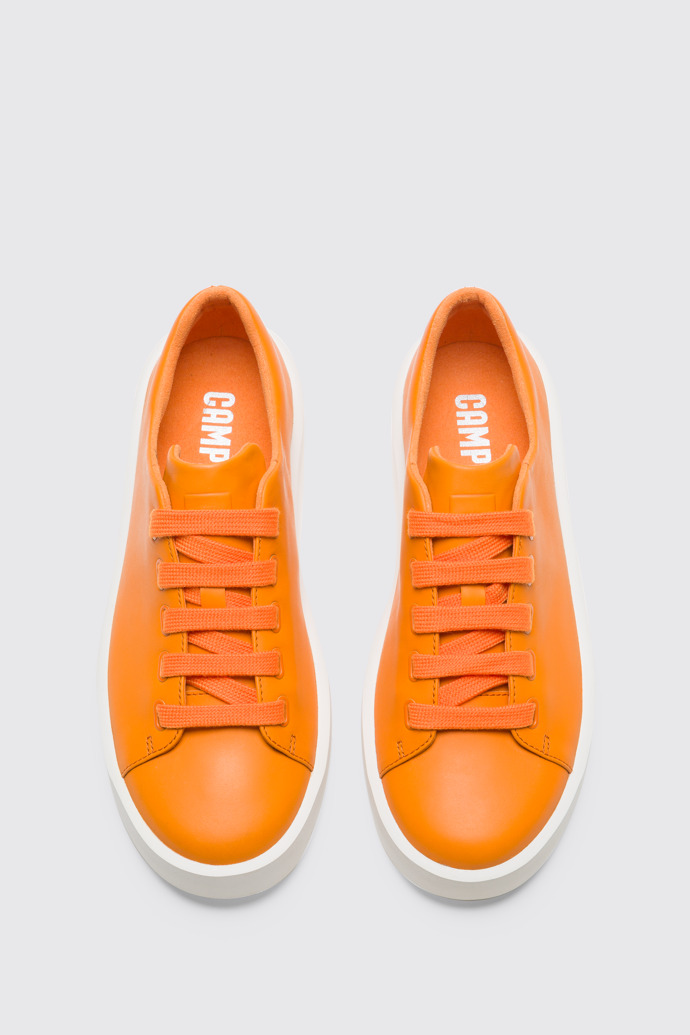 Overhead view of Courb Women's orange sneaker