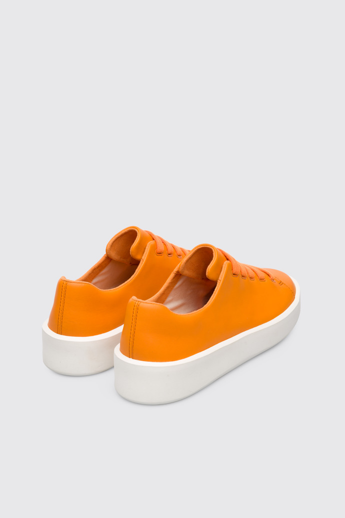 Back view of Courb Women's orange sneaker