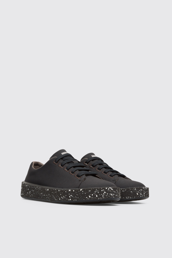 Front view of Courb Women's black sneaker