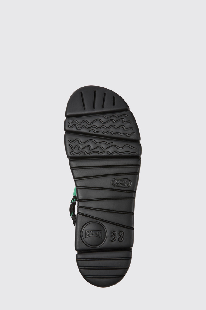 The sole of Oruga Black, pink, and green leather sandals for women